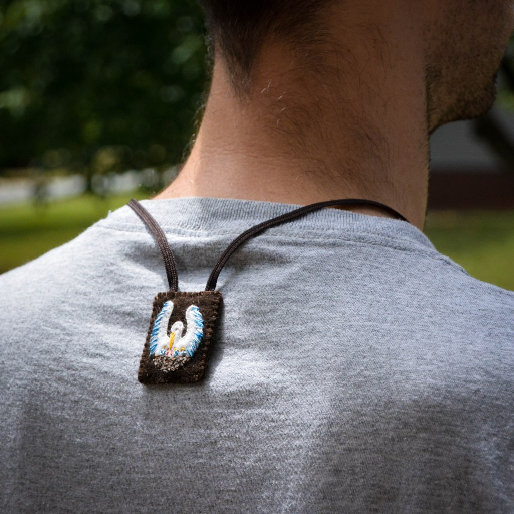 Photo of man wearing Pelican Brown Scapular