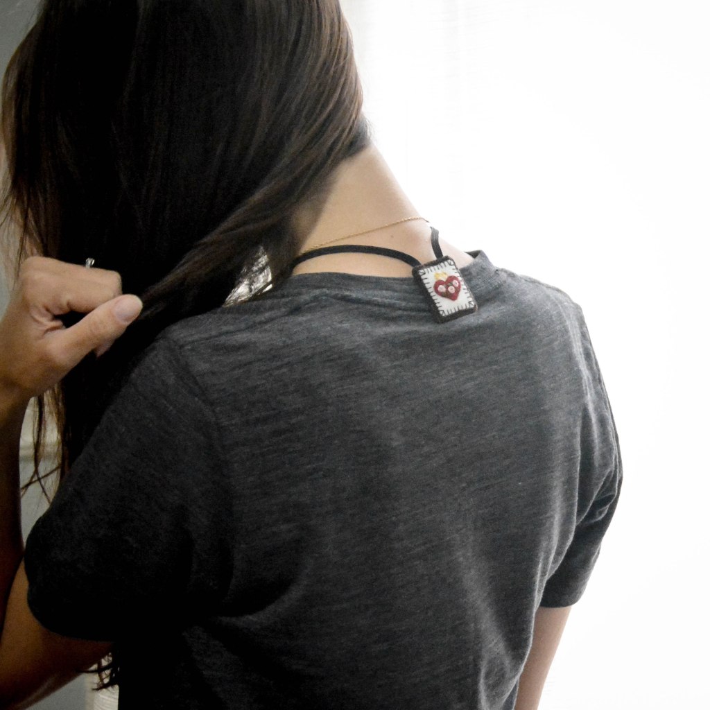 Picture of Woman wearing Sacred and Immaculate Heart Scapular