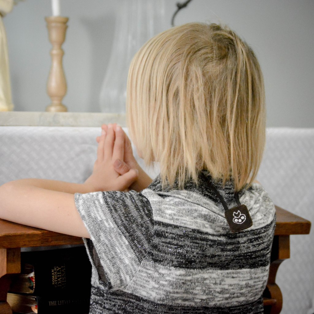 Young Girl Wearing Immaculate Heart Scapular